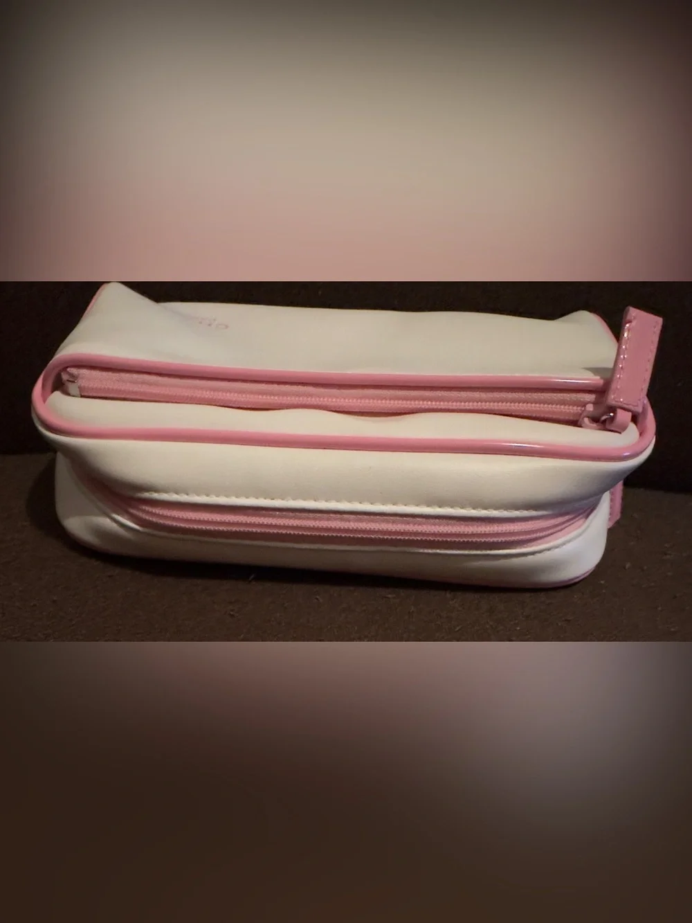 CHANEL White Cosmetic Pouch with Pink Trim. 9.25”W x 7”H.